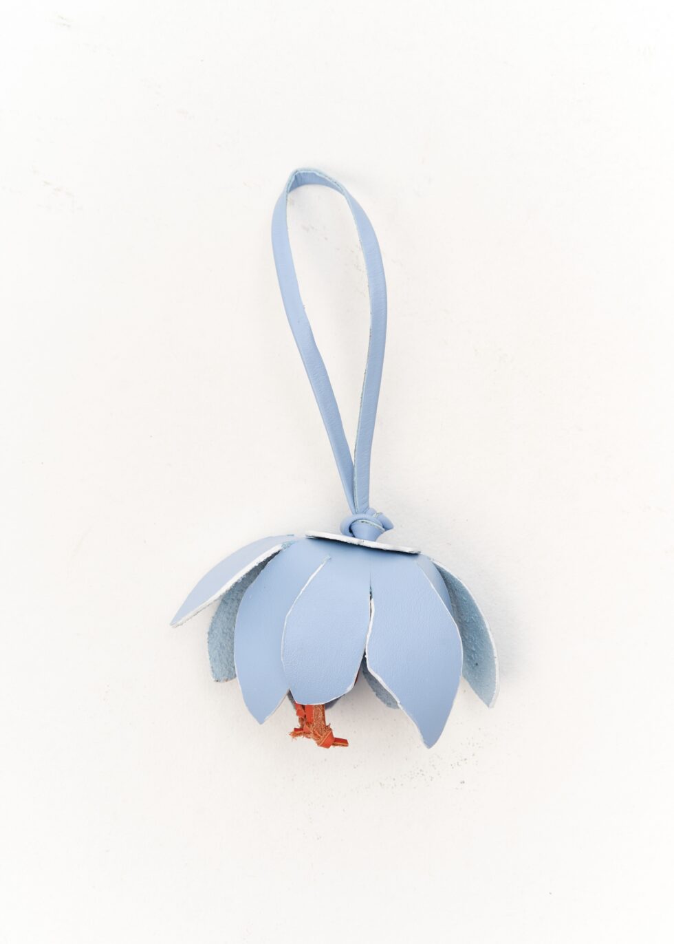 блакитний декоративний брелок для сумки